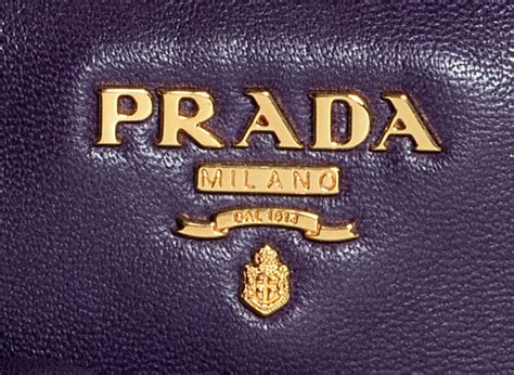 prada fake vs authentic logo shopper tote|prada logo authenticity.